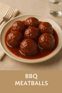 BBQ-glazed meatballs in rich sauce served on a beige plate with text overlay reading “BBQ MEATBALLS”
