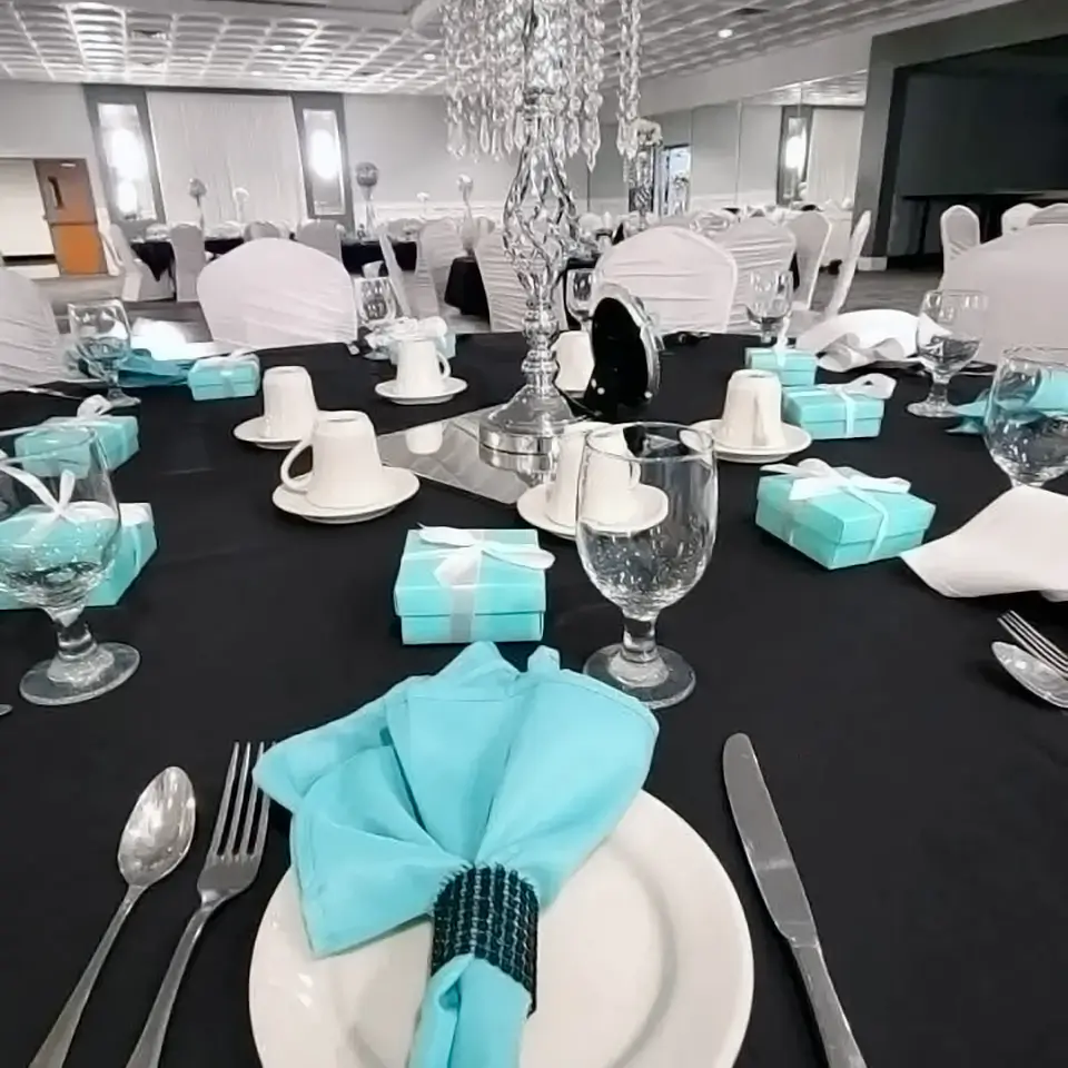Tiffany blue and white wedding banquet table with crystal centerpiece at Macedonian Culture Center in Crown Point, Indiana